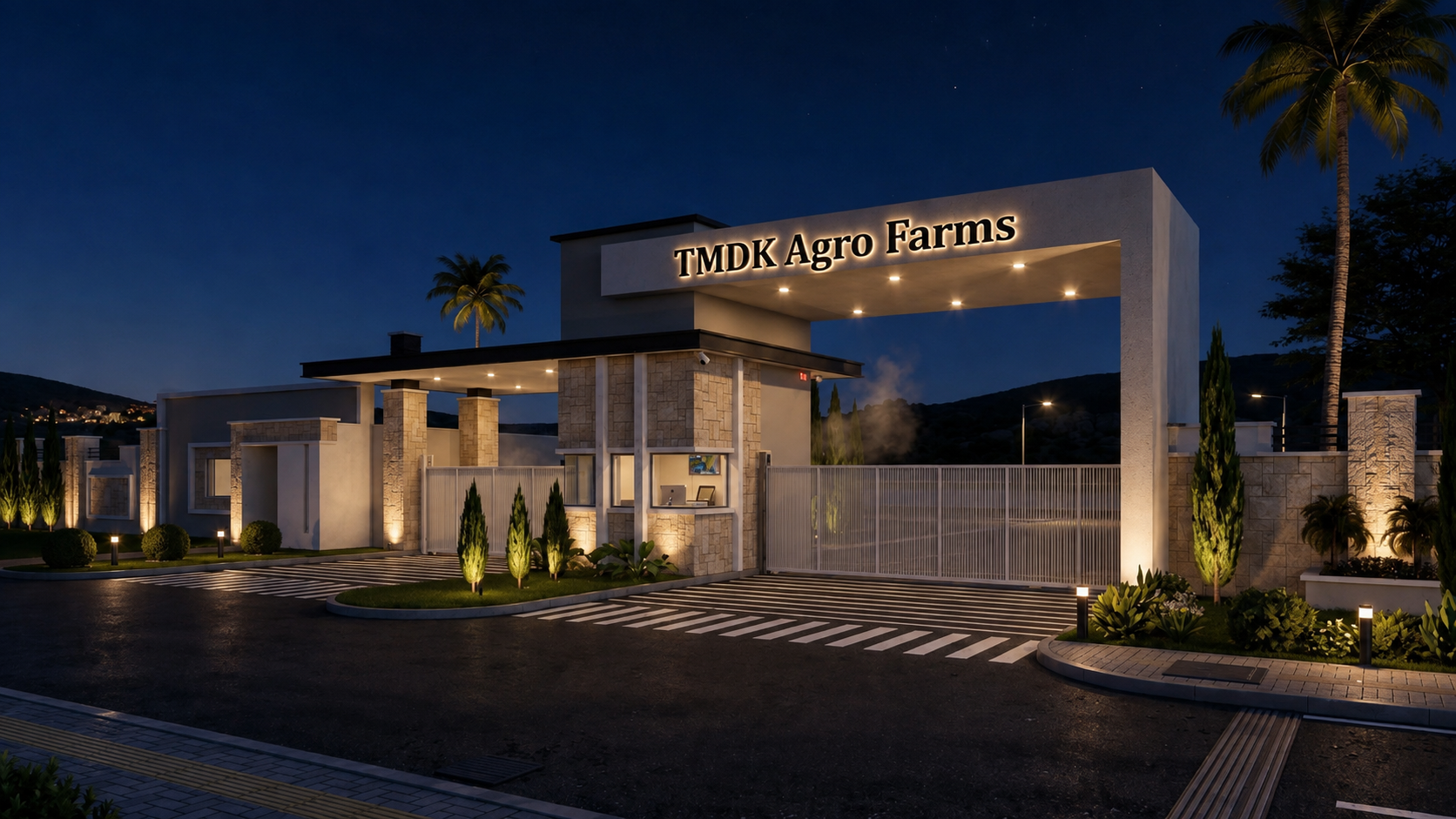 TMDK Agro Farms entrance gate at night